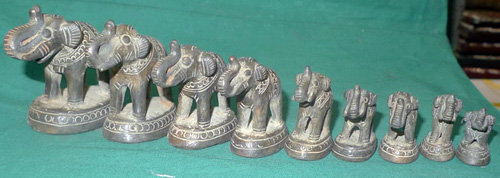 Set of 9 opium weights Set of 9 opium weights