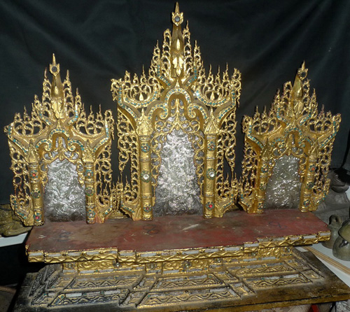 Triple buddhist shrine Triple buddhist shrine