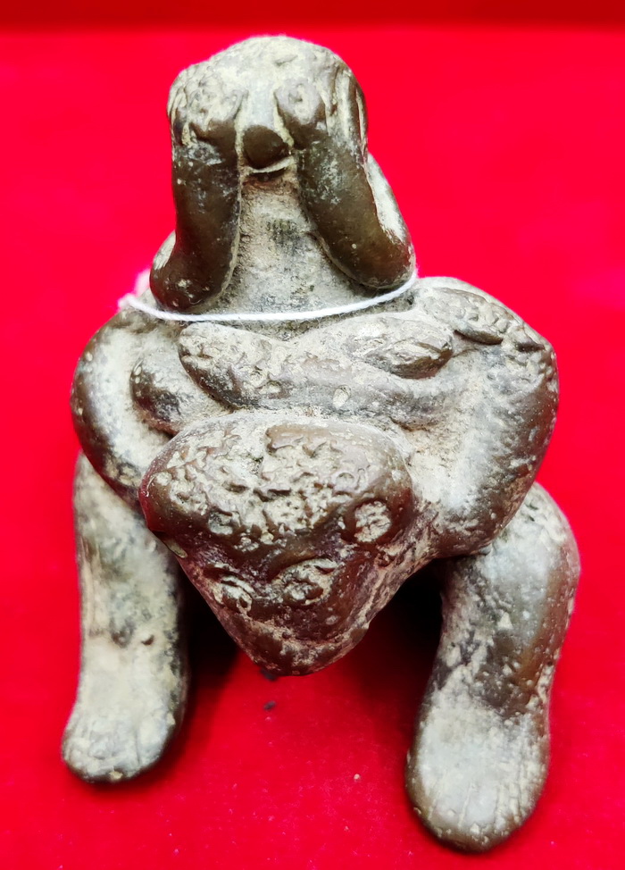 Buddha Pit Tha (closed eyes) on monkey
