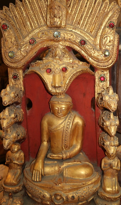 Buddha decorated w. nats, mythocological animals, etc.