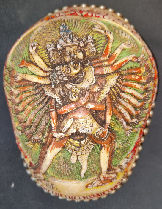 Tantric kapala, skull cap, carved