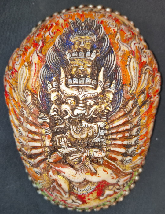 Tantric kapala, skull cap, carved