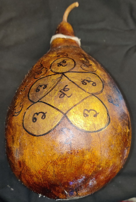 Buddhist painting on dry fruit